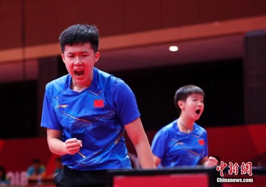 資料圖：雅加達亞運會，王楚欽/孫穎莎奪得混雙冠軍。 <a target='_blank' href='/'>中新社</a>記者 劉關(guān)關(guān) 攝