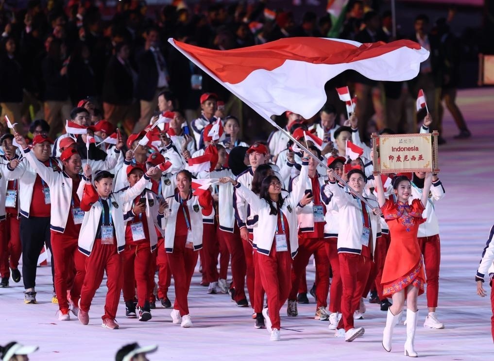 7月28日，印度尼西亞大學(xué)生體育代表團(tuán)在開幕式上入場。新華社記者張麗蕓攝