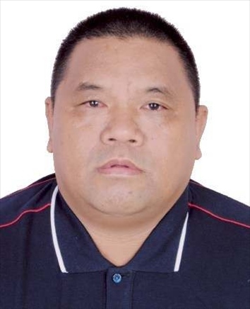 犯罪嫌疑人肖巖塊(何春田)