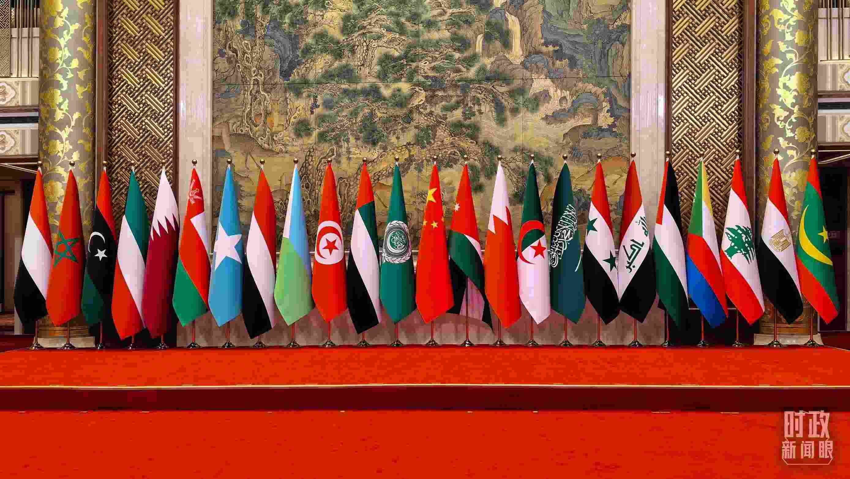 △會議現(xiàn)場的集體合影區(qū)。（總臺央廣記者潘毅拍攝）