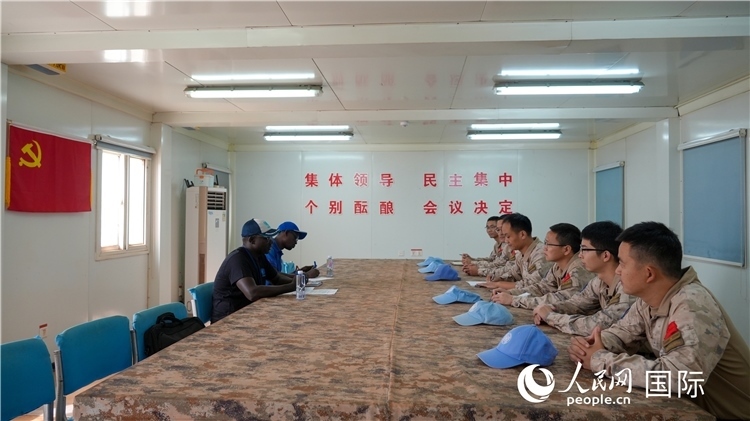 圖1 檢查組聽取工作匯報。王軍杰攝