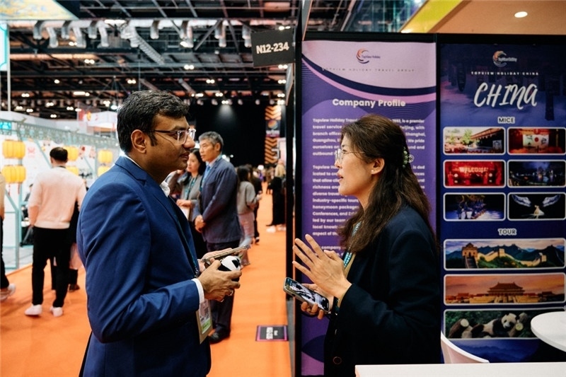 “中國(guó)館”展區(qū)現(xiàn)場(chǎng)洽談。 楊浩鵬攝