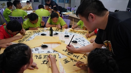 書法教學(xué)。主辦方供圖